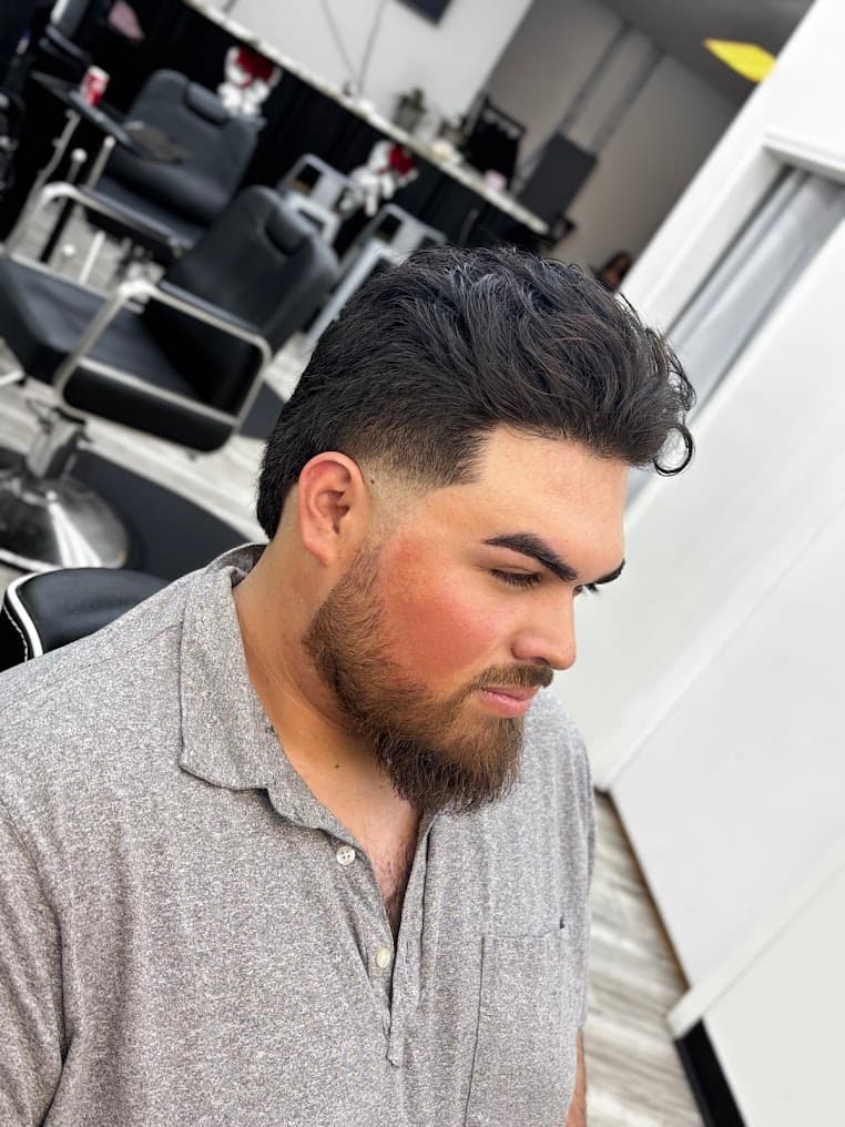 Oscar A. Barber finished haircut detail